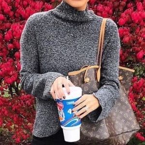 Calvin Klein turtleneck sweater.