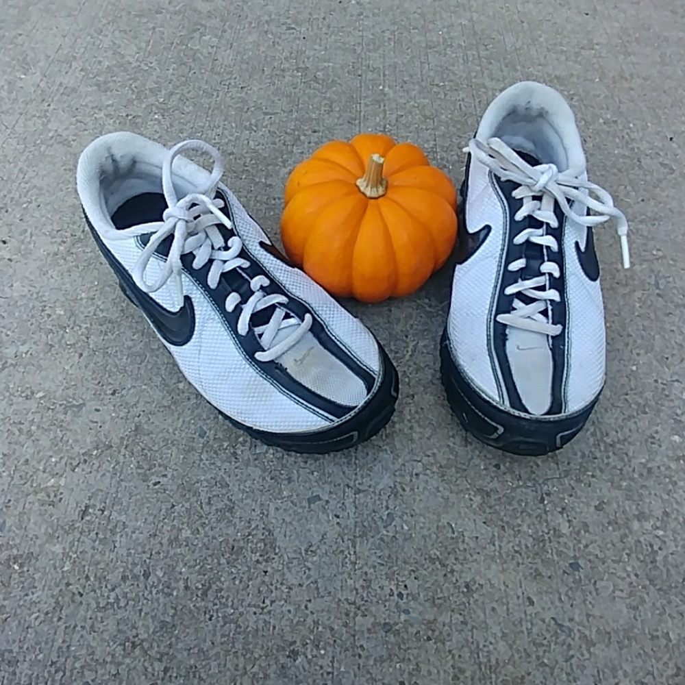 Nike black and white sneakers with shocks