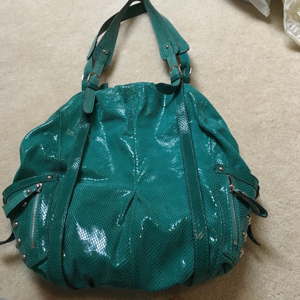 Turquoise HYPE leather shiny bag with metal studs