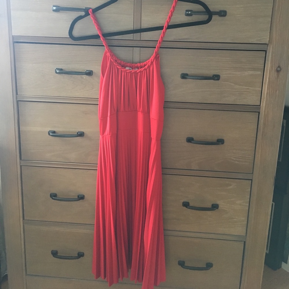 Red satin pleated empire waist dress