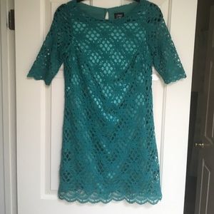 Green dress with lace overlay