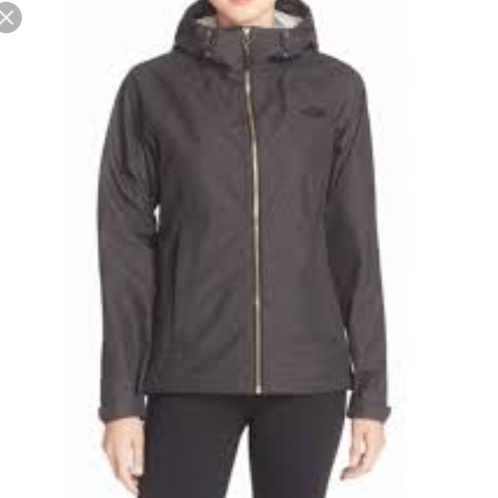 Like new black and gold north face rain jacket