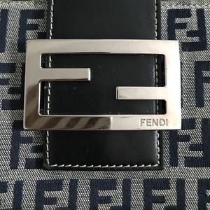 Aunthentic Fendi Compact wallet with FF logo.