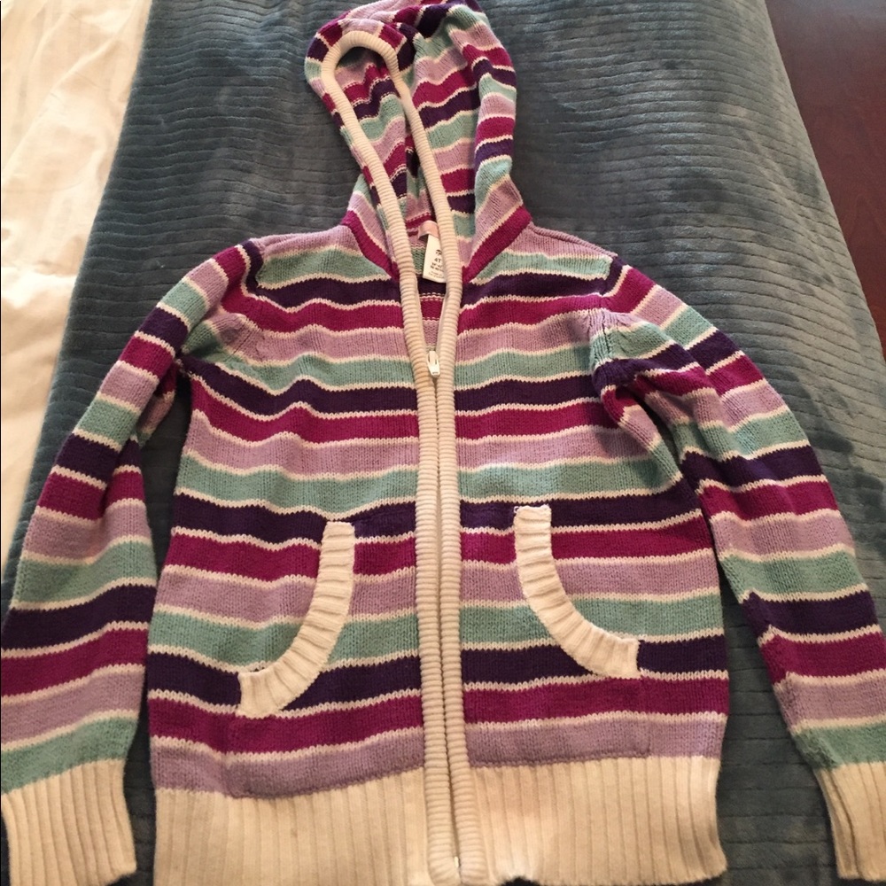 Striped zippered cardigan.