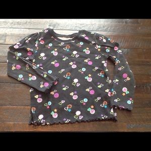 Little Girls long sleeve black decorative shirt.