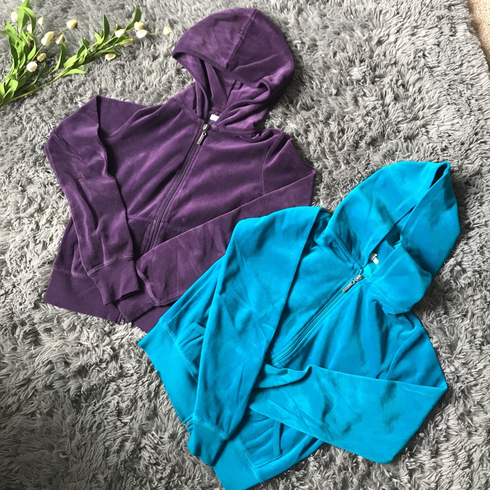 Velour track jackets, purple and blue .
