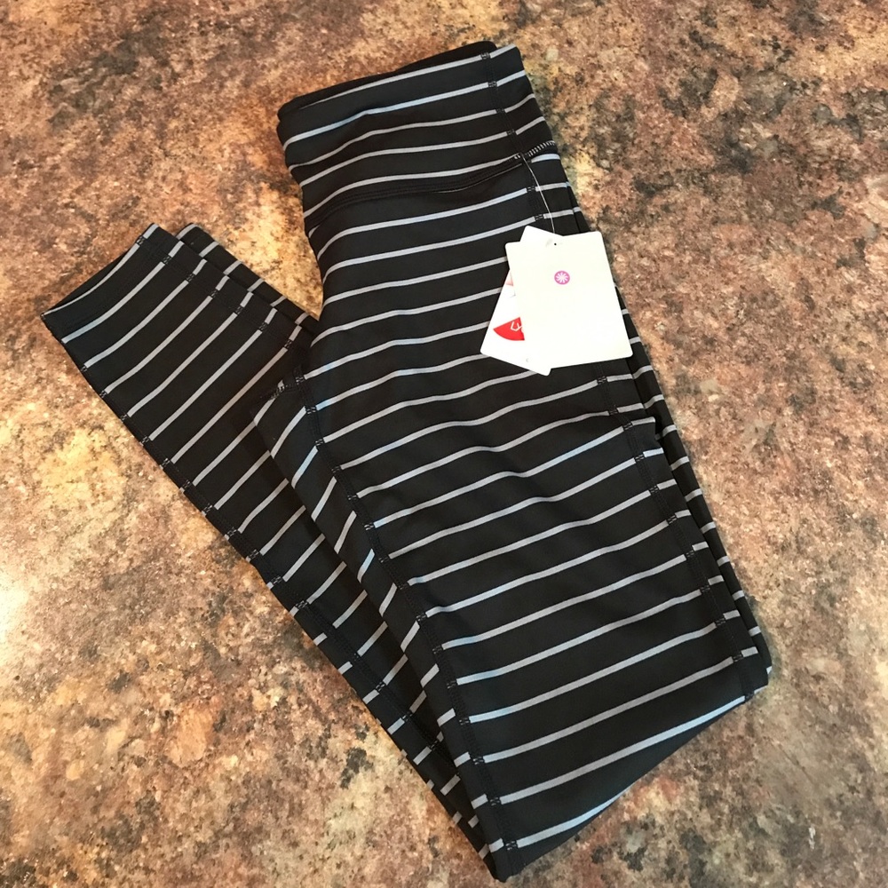 NWT Athleta stripes chaturanga tight size small