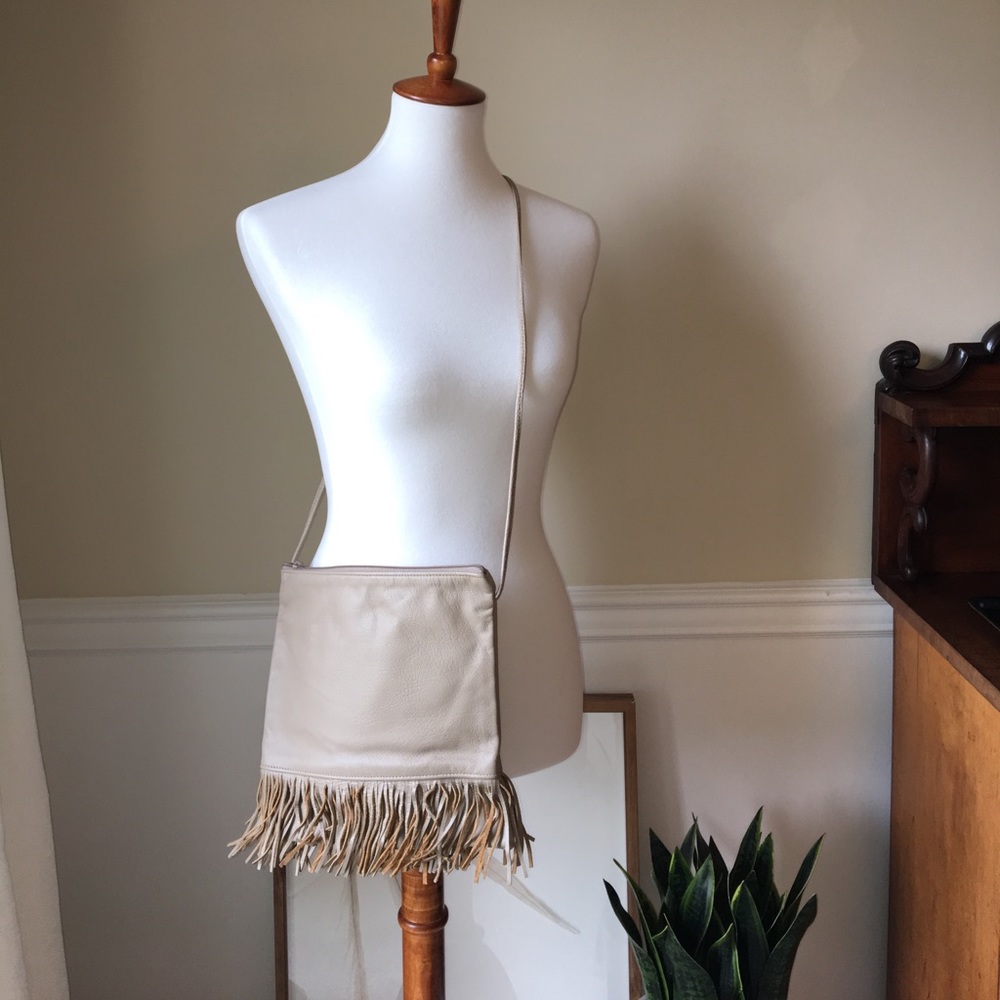 Real leather cross body bag with fringe