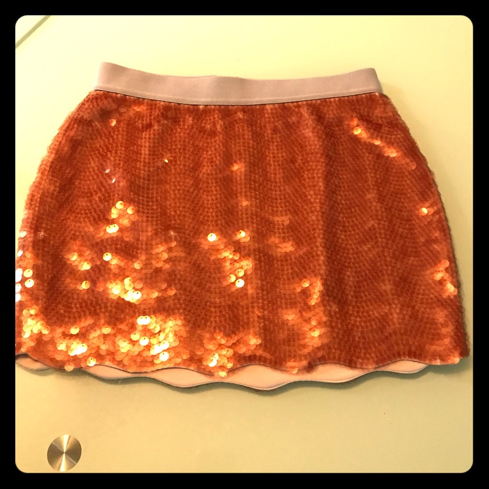 BCBG Max Azria rusty orange pilates and wavy hem