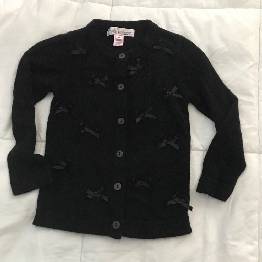 Black Sweater w/black bows. Barely worn. Size 4