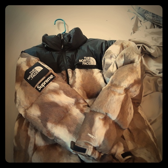 supreme puffer jacket retail