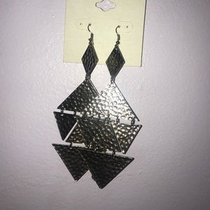 Dangling silver triangles