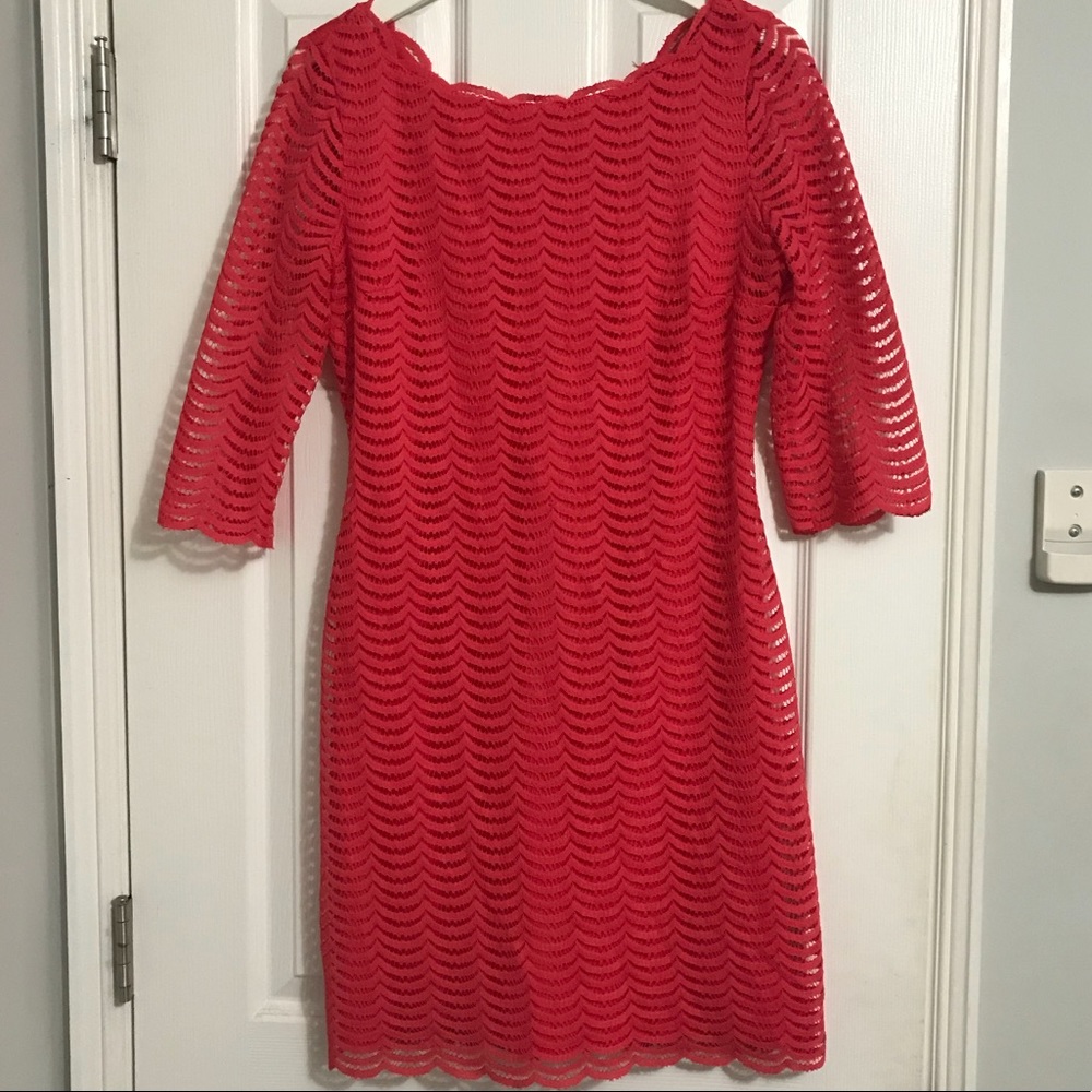 Pink cocktail dress with scalloped detail