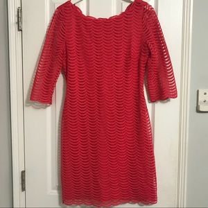 Pink cocktail dress with scalloped detail