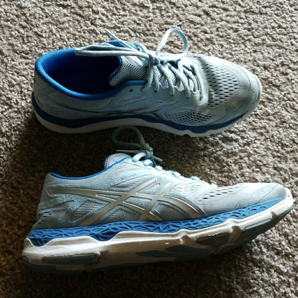 Light Blue Asics running/lifting shoes.