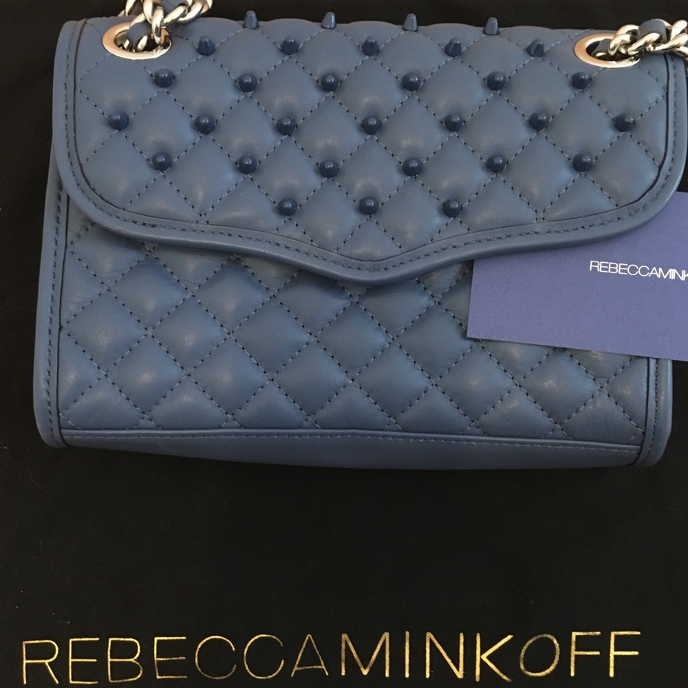 Rare blue studded RebeccaMinkoff cross body bag.