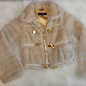 Beautiful fur jacket with gold details