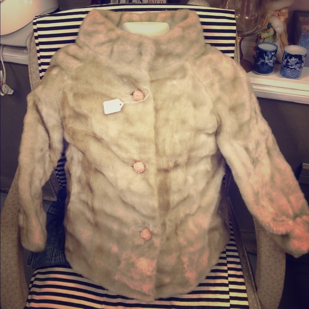 A faux fur coat the size is small