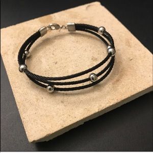 BLACK AND SILVER TONE BRACELET