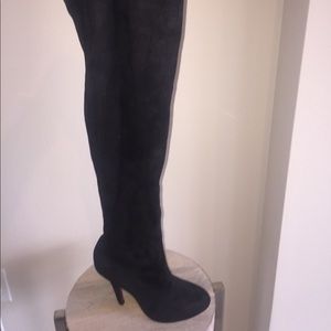 Thigh high black boot