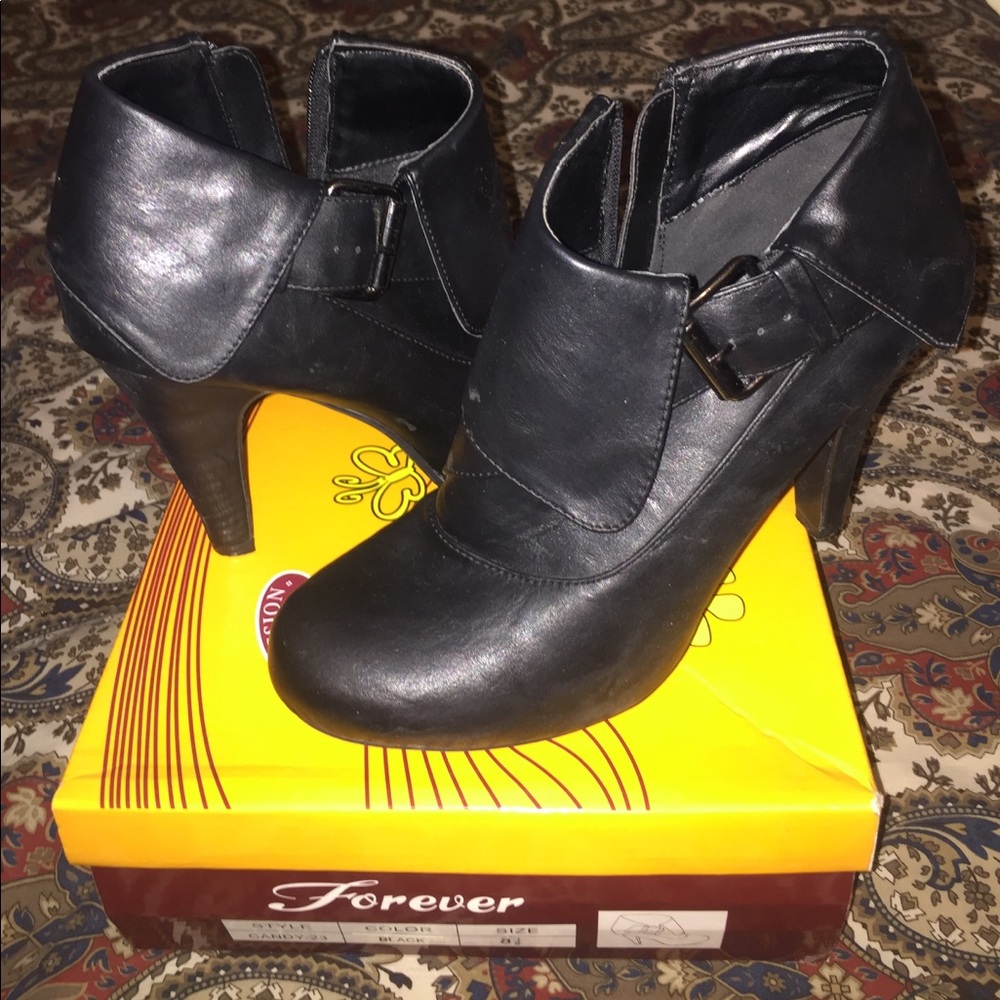 Black bootie heels size 8.5