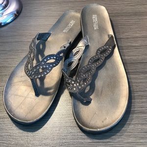 Black gemstone flip flops