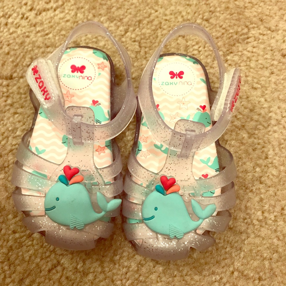 Worn once sparkly Jelly sandals with whale.