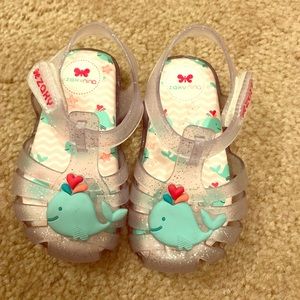 Worn once sparkly Jelly sandals with whale.
