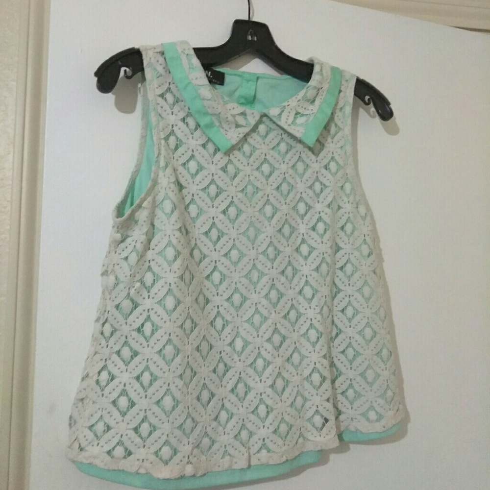 Sleeveless mint green shirt