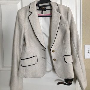 Gorgeous creme blazer wi/black trim, gold buttons