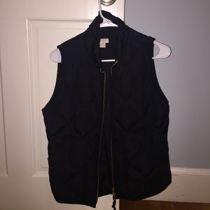 Hardly worn JCrew vest black size extra small.