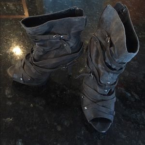 Grey strappy open- toe booties.