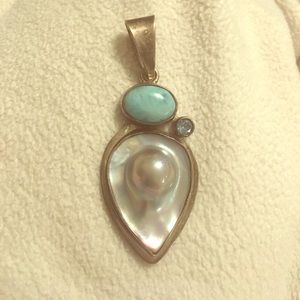 Silver pendant with natural stones