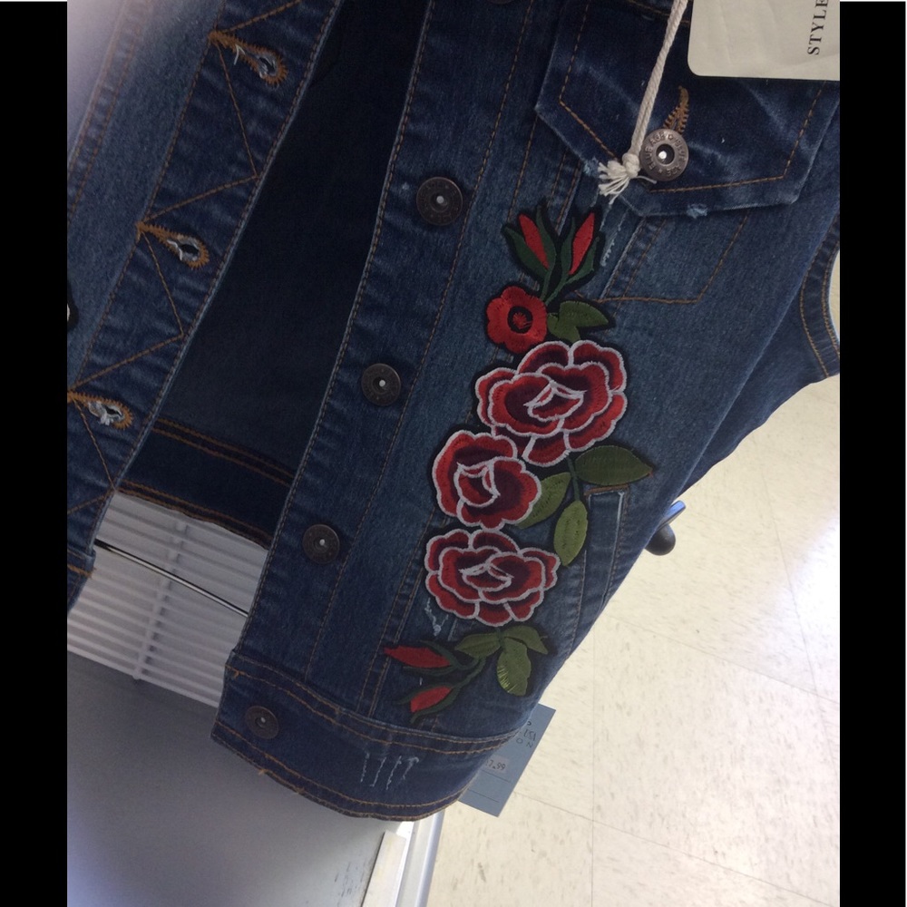 Demin vest with flowers in the front