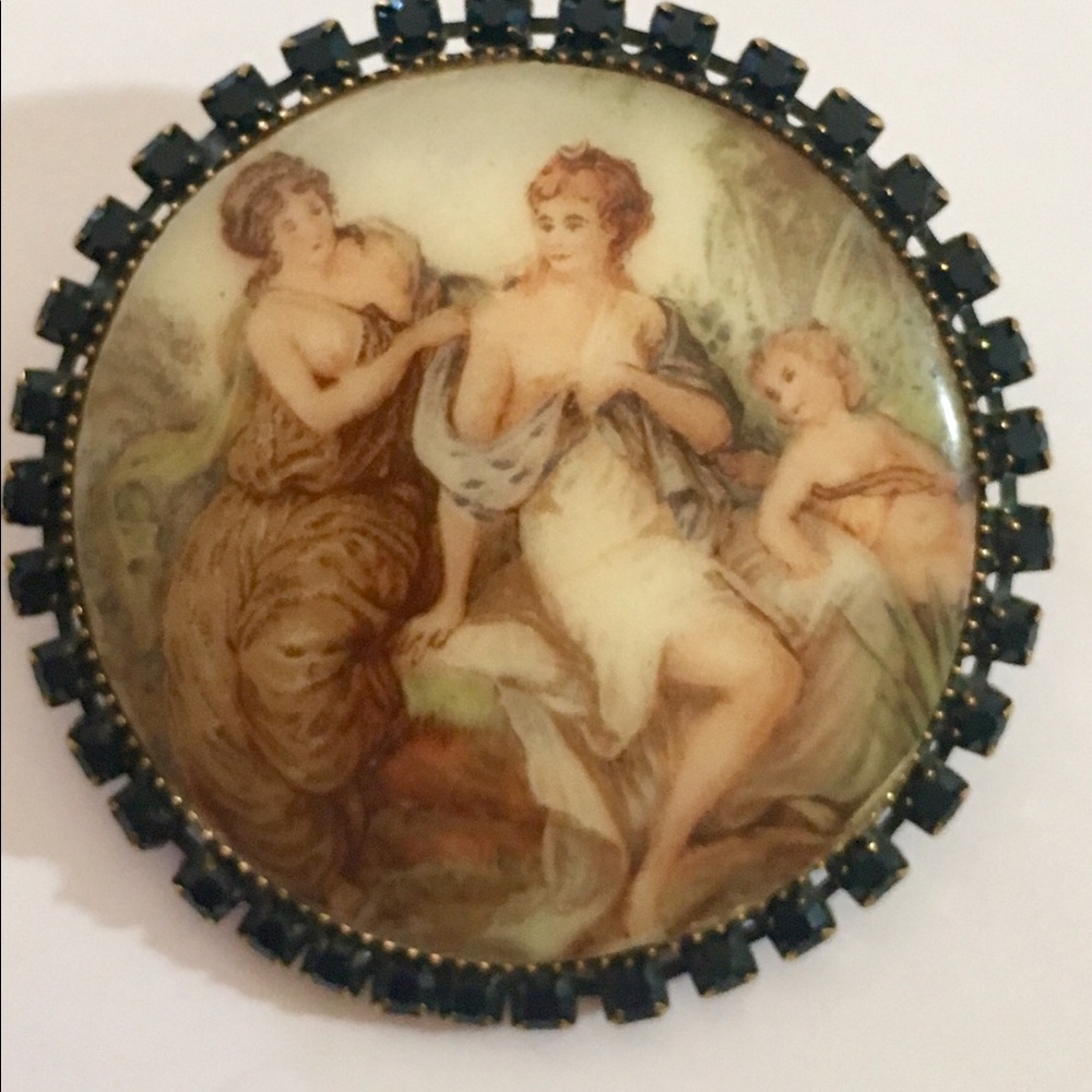 Porcelain painted broach with faux garnet surround