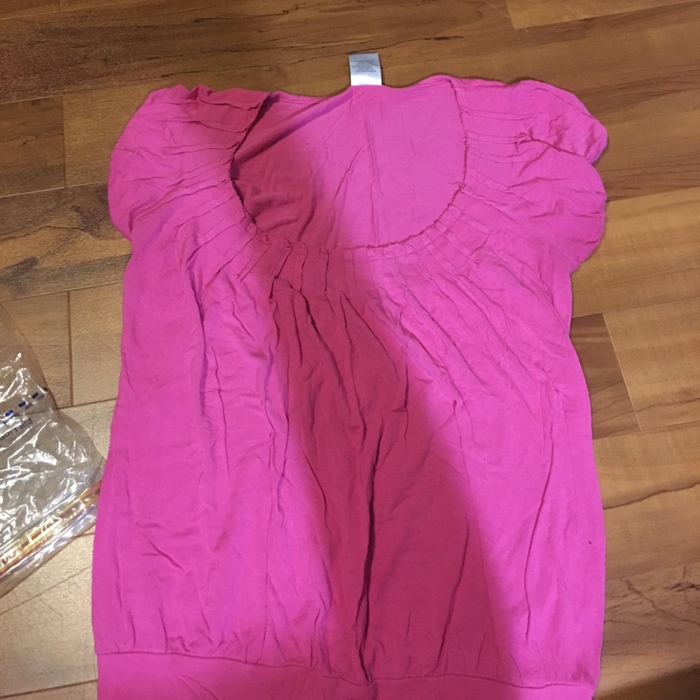 PInk shirt with ruffles