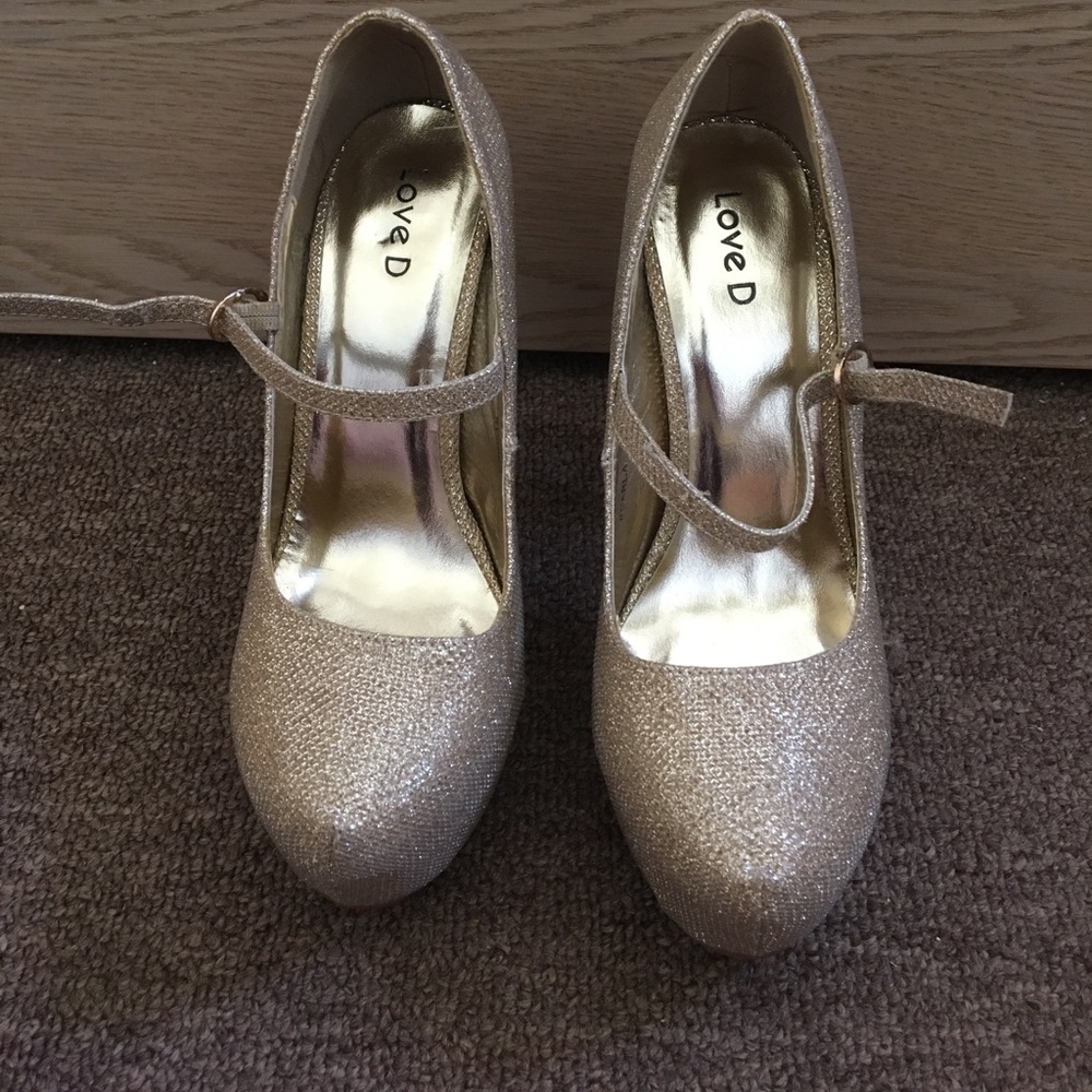 Gold high heels