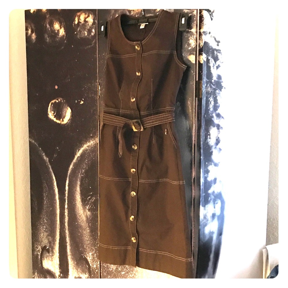 100% Dark Brown dress with a buckle belt .