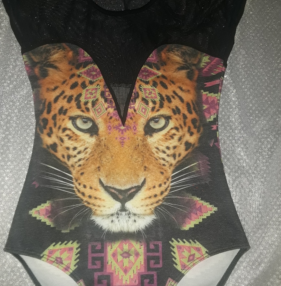 Onesie with a meshed top