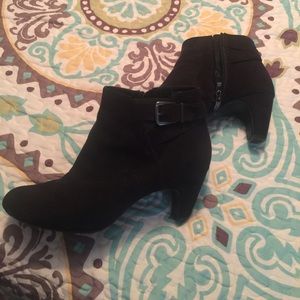 Perfect black booties with side buckle accent.