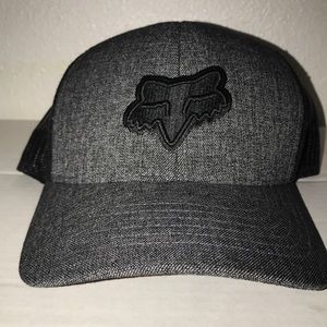 Black and gray Fox snapback hat.