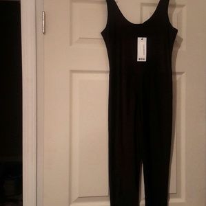 Jumpsuit black, half silky, half shimmery 10