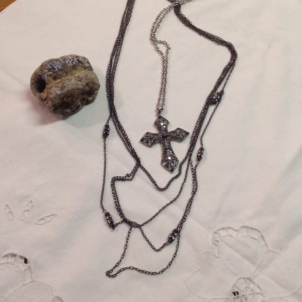 Cross pendant necklace layered.