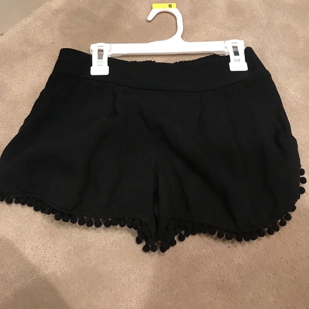 black pom pom shorts