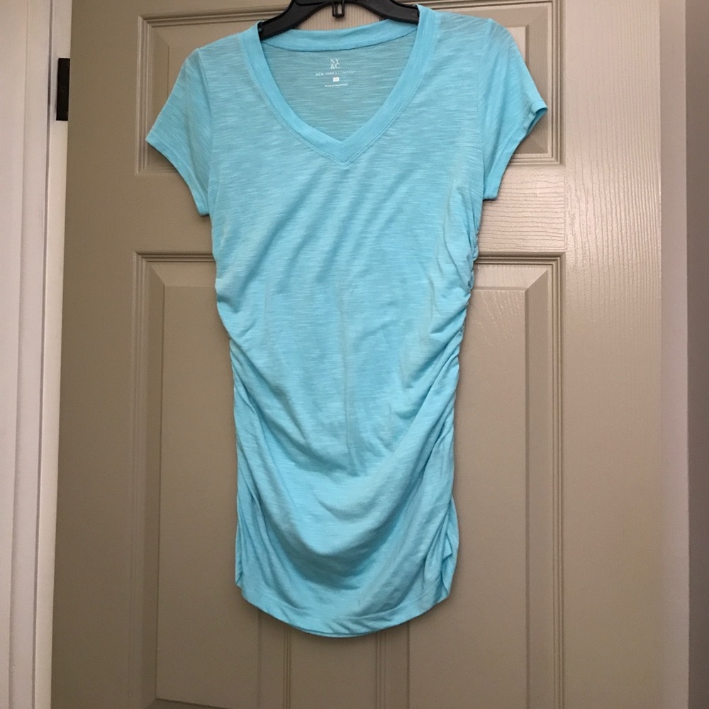 Long t-shirt that is gathered on the sides