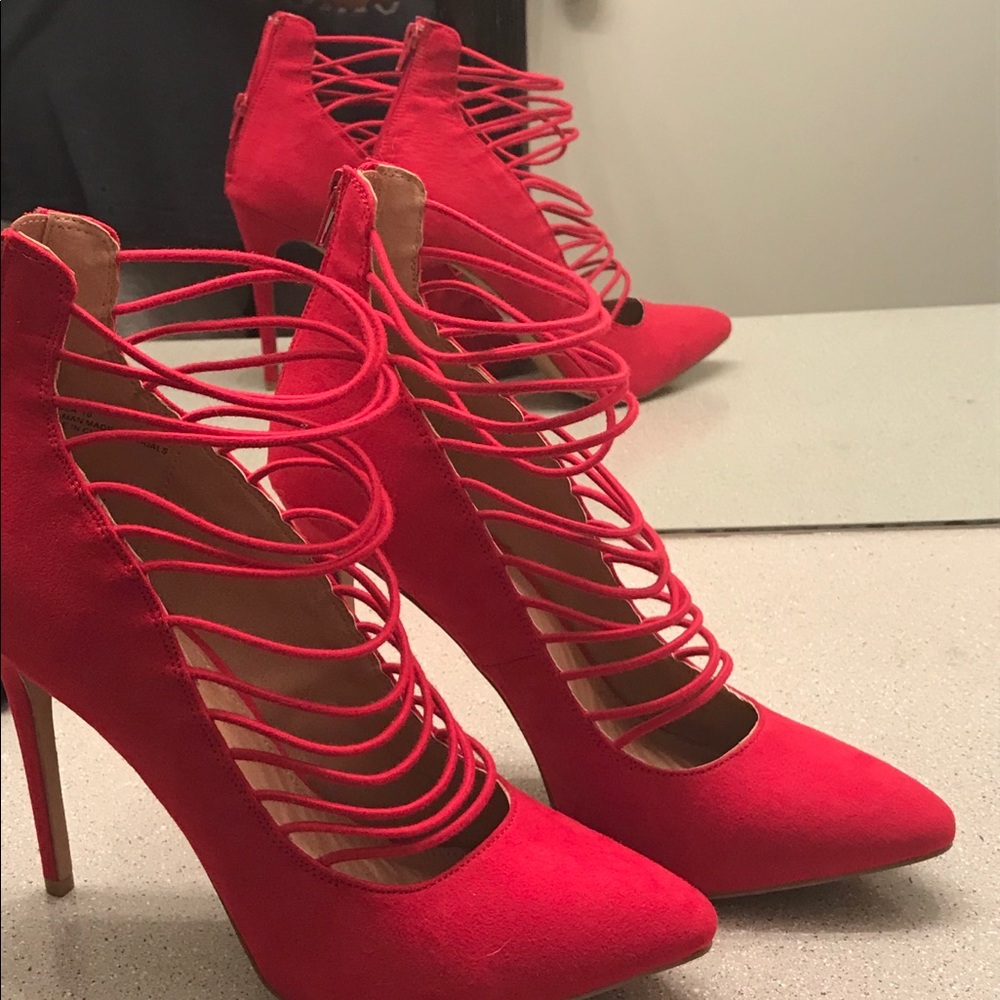 Red strappy high heel shoes