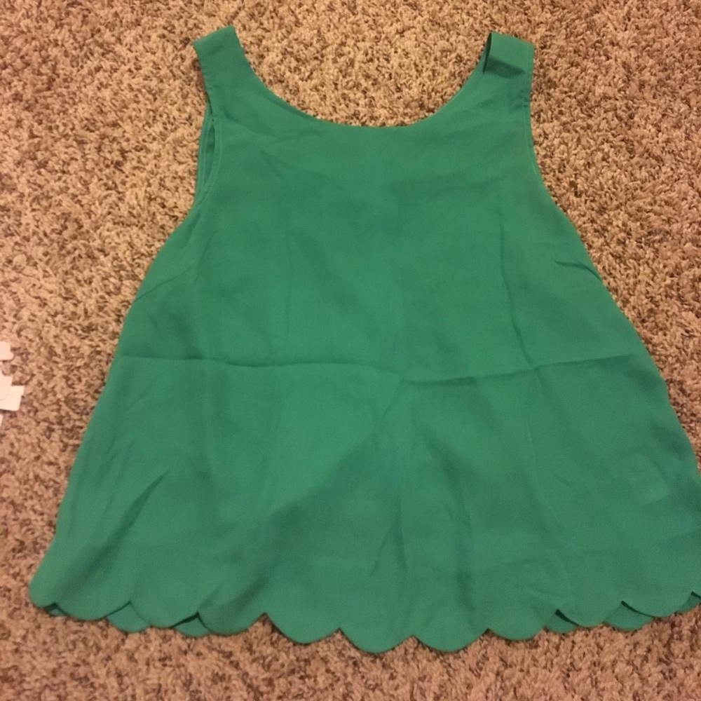 Green scalloped top with open back