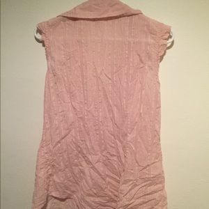 Light pink collared sleeveless shirt