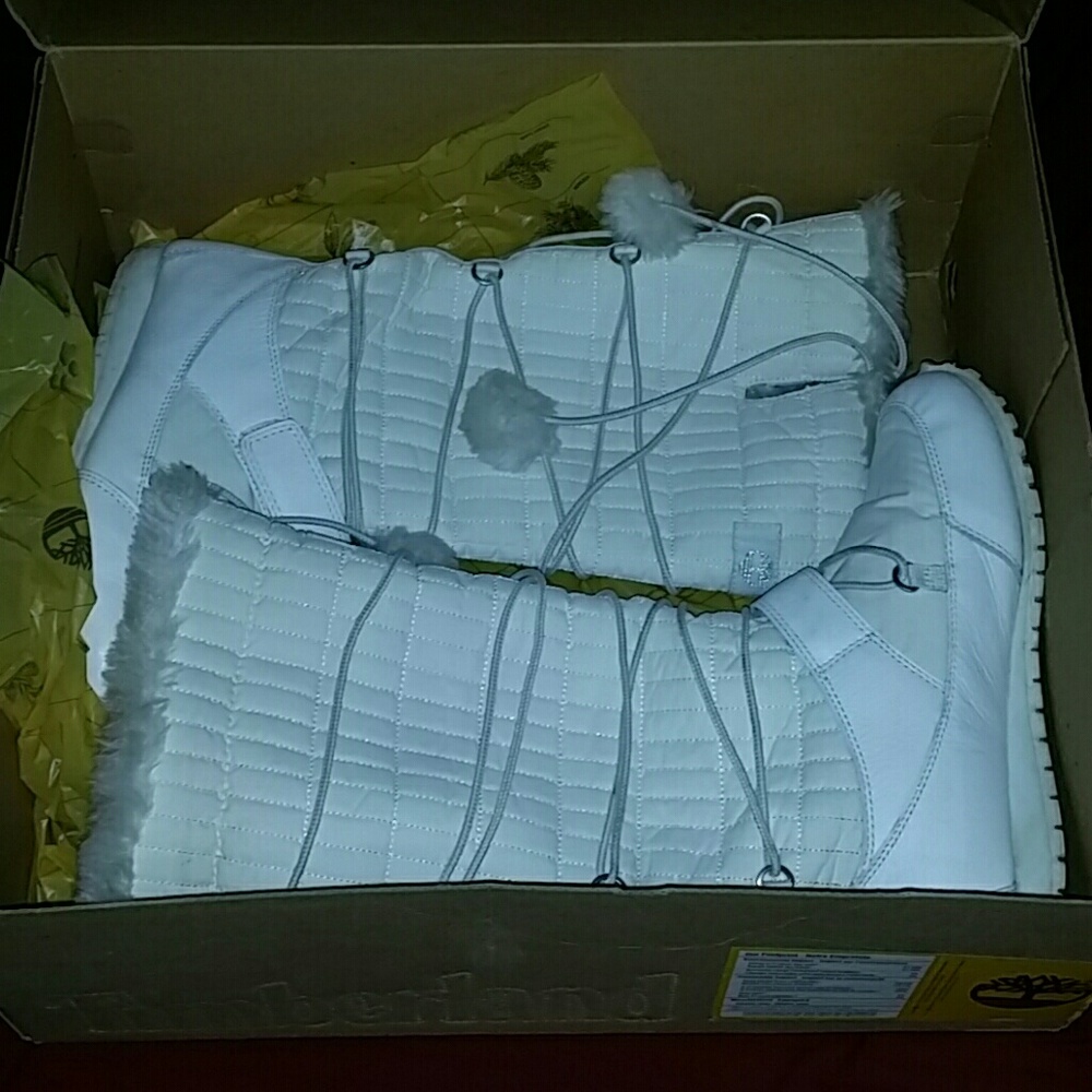 Gently used white Timberland snow boots