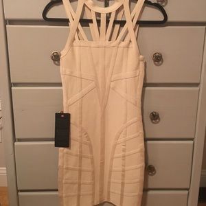 NWT cream colored Bodycon BEBE dress